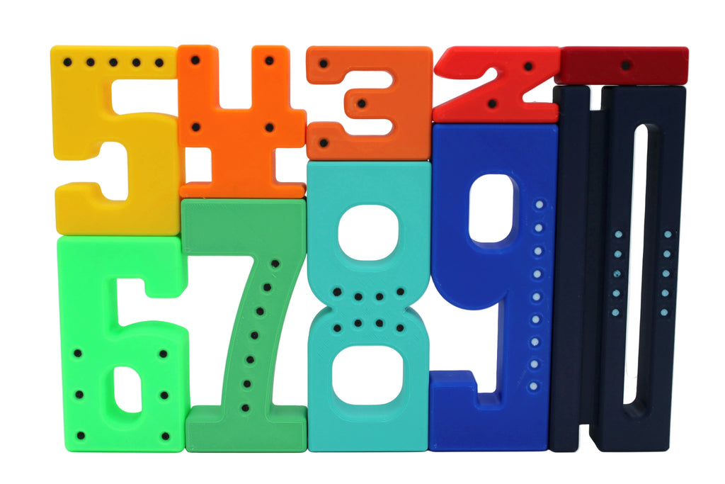 Colorful plastic numbers on a white background